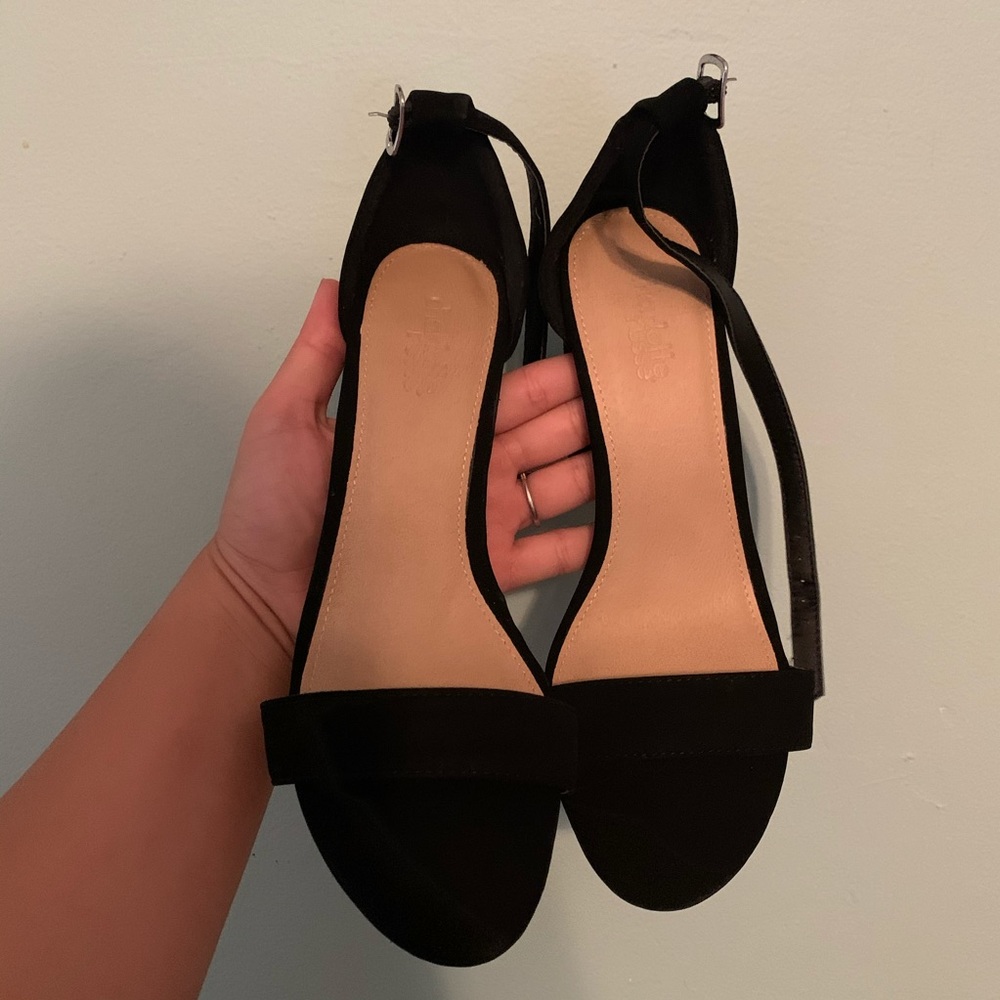 Woman’s black heels